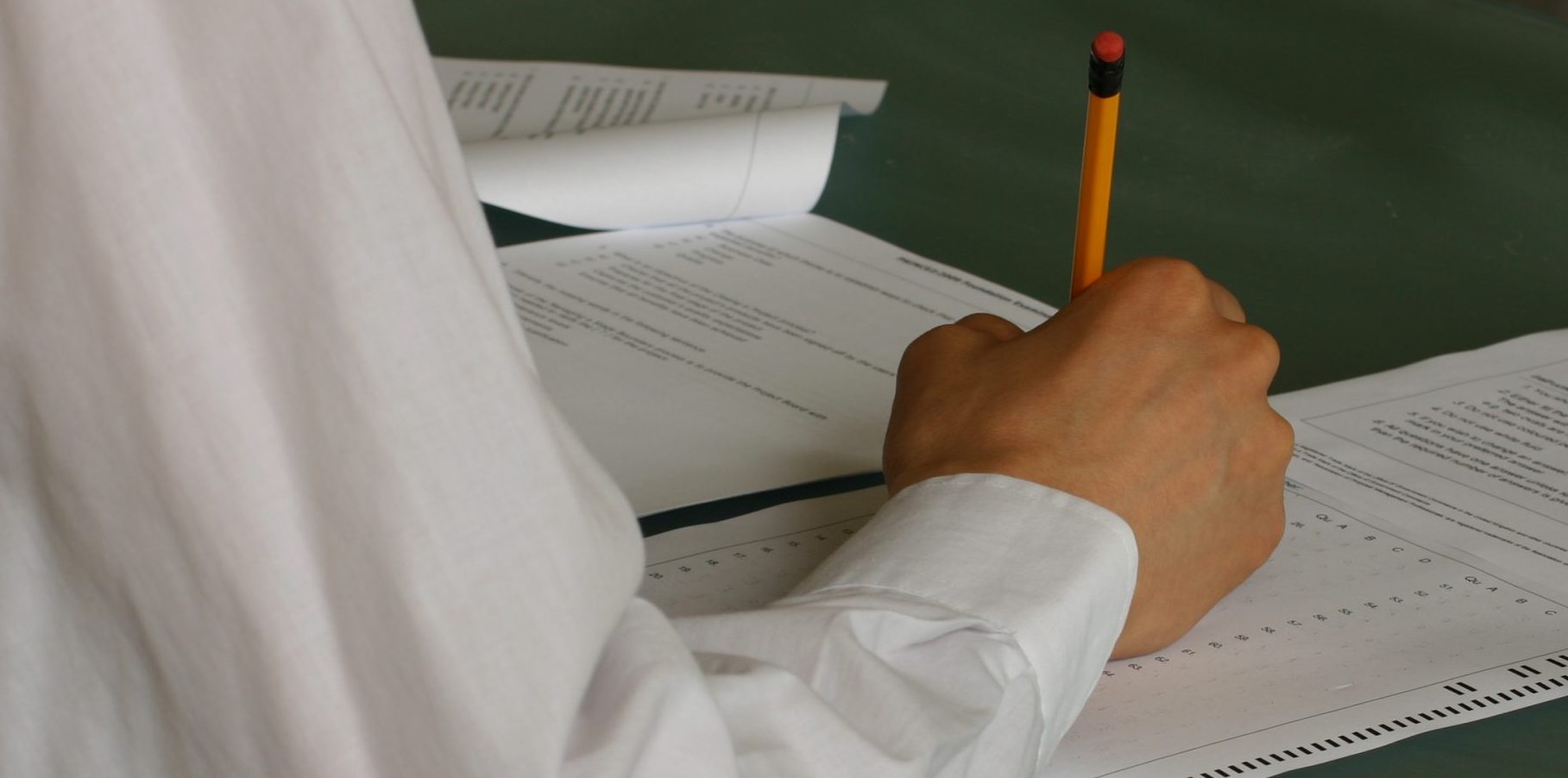 hand-writing-exam-classroom