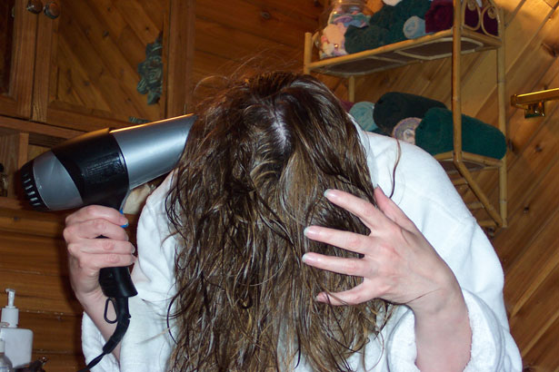 woman-drying-hair-234412889835803tz