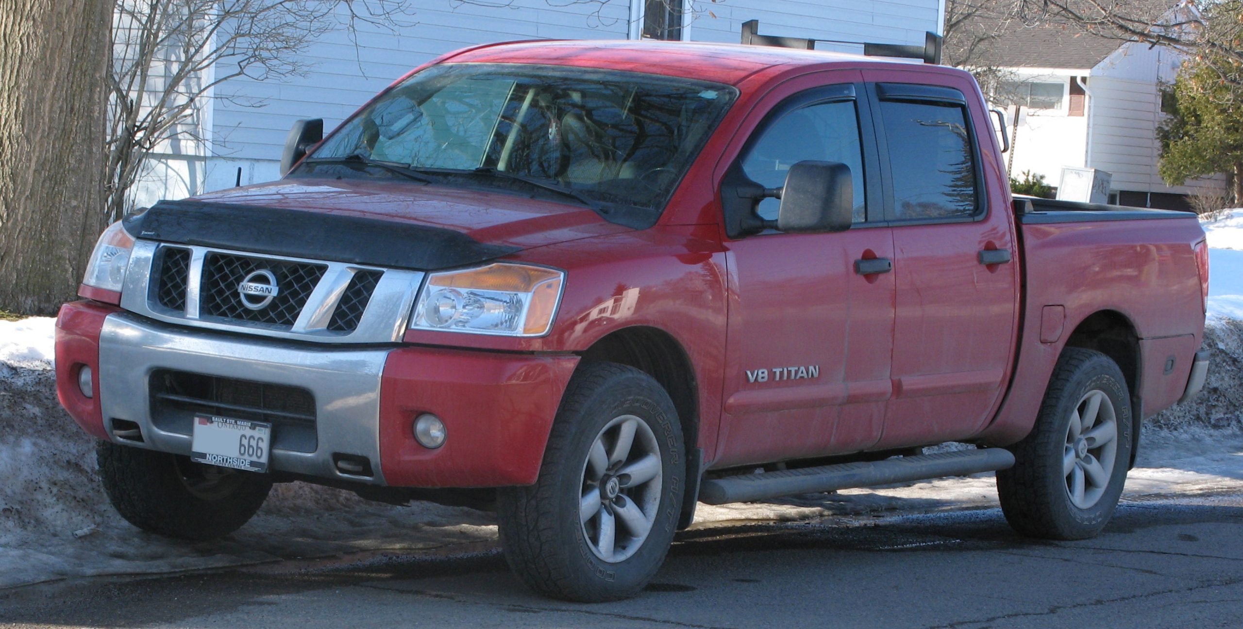 2012_nissan_titan_sv_4x4_front_left_03-09-2021