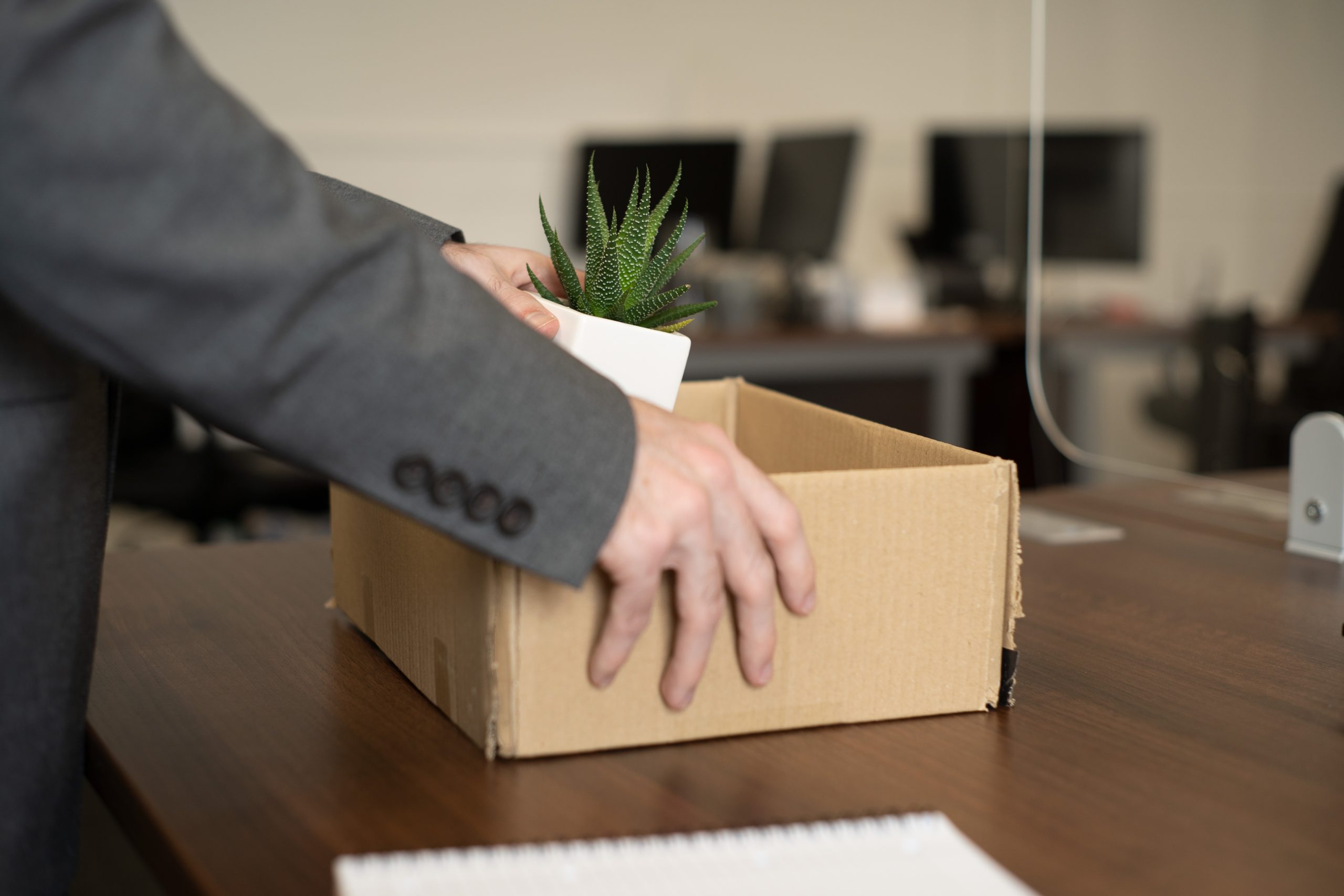 employee_packing_things_into_box