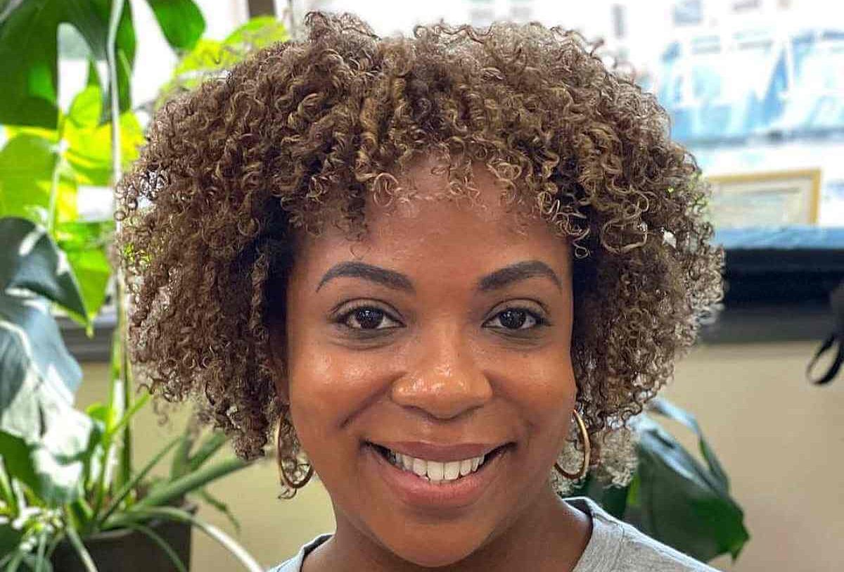highlighted-tight-blonde-short-curls-for-ladies-over-forty