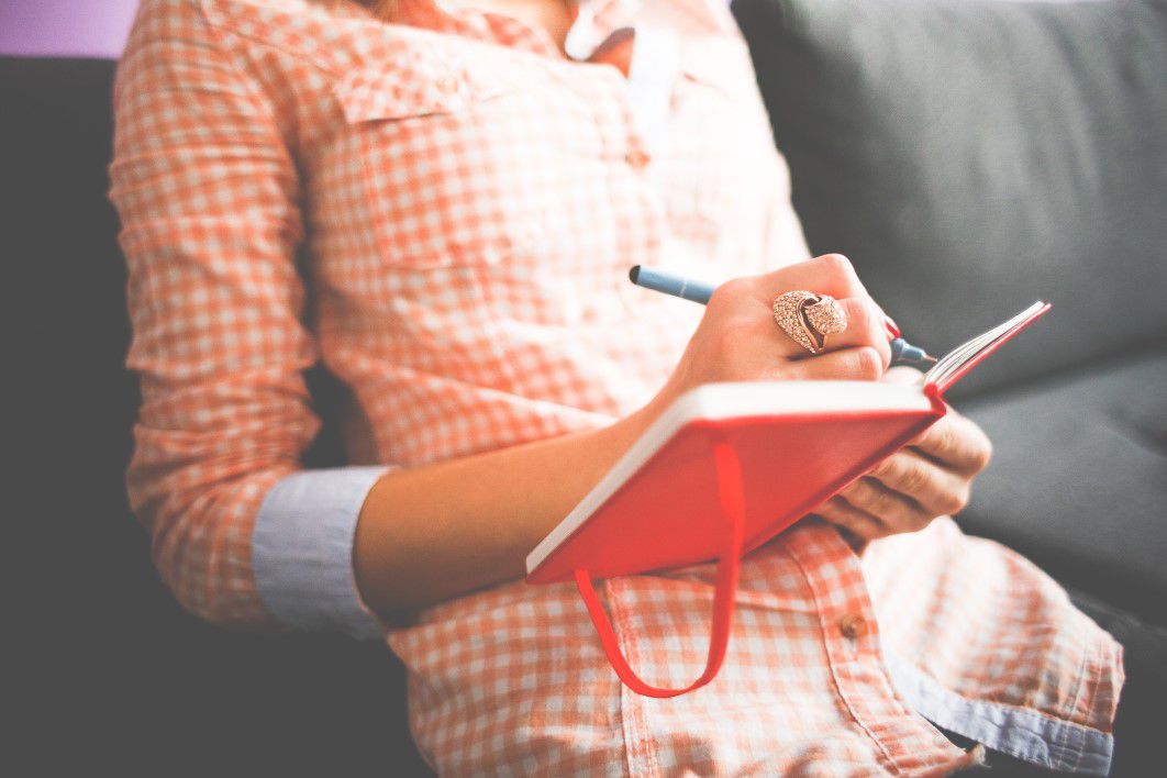 negative-space-woman-writing-diary-red-ring-bling-pixabay-thumb-1