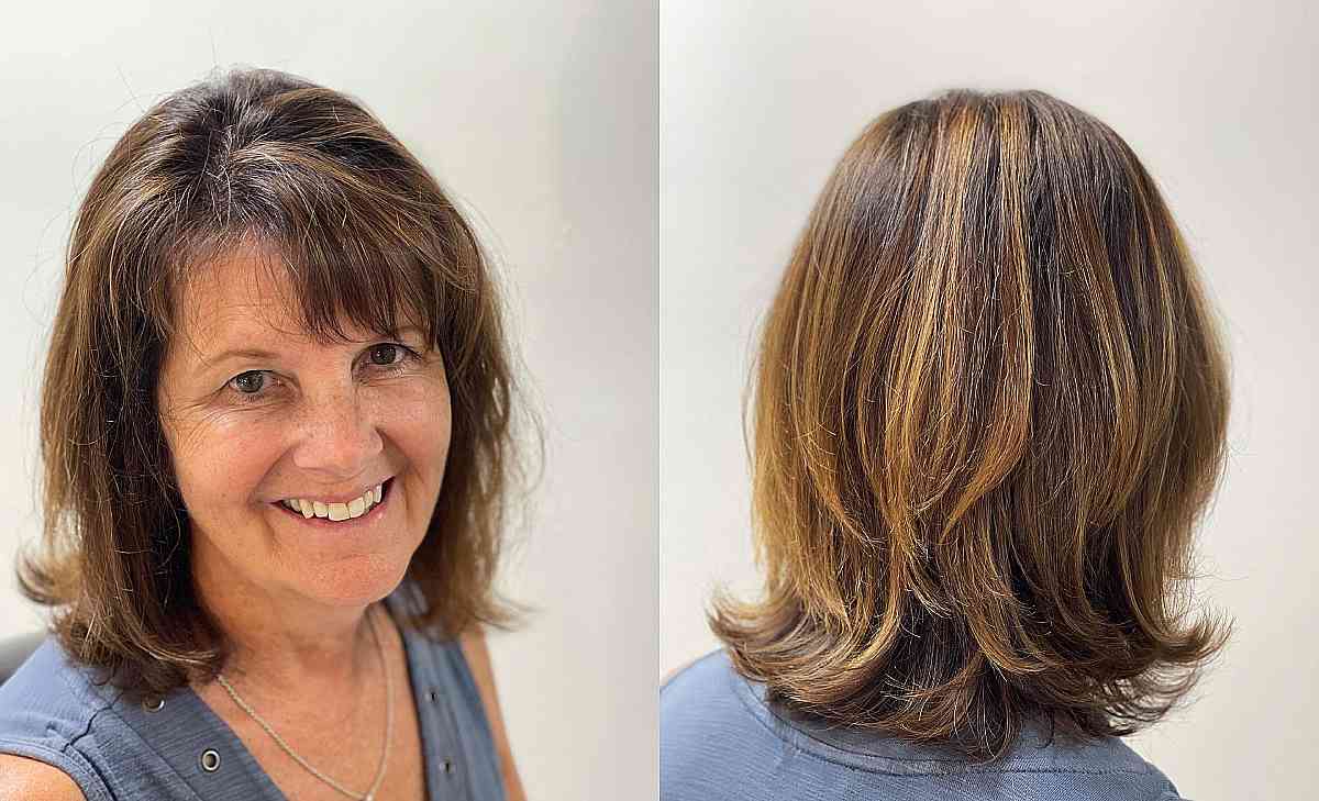 sun-kissed-medium-layered-cut-with-side-bangs-for-ladies-over-50