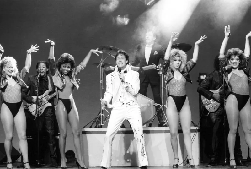 gettyimages-74260657-turn-it-down-please-here-are-the-most-annoying-pop-songs-ever-made-rick-dees-scaled-jpg-pro-cmg