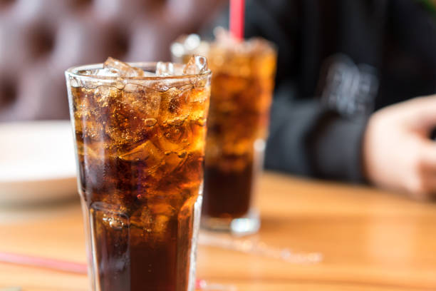 soft-drink-on-wooden-table-and-men-sitting