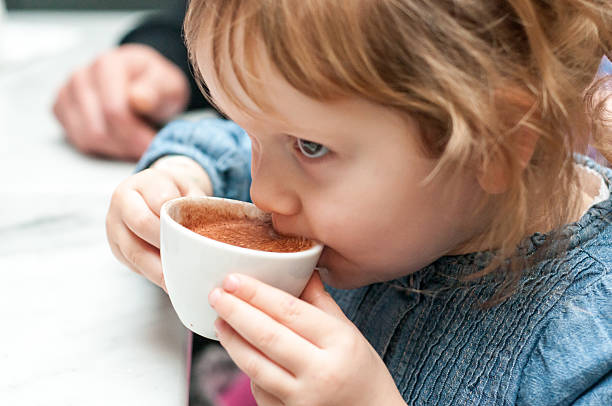 young-girl-drinking-a-warm-chocolate-drink