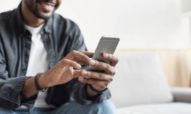 young-men-using-mobile-phone-business-communication-technology-concept