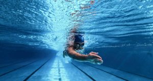 swimmer-swimm-freestyle-in-swimming-pool