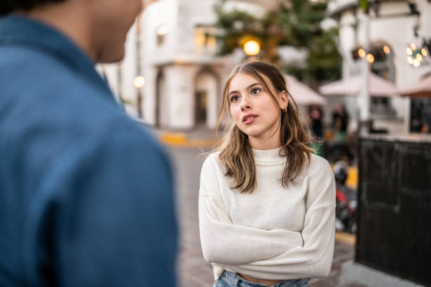 young-couple-having-an-argument-outdoors