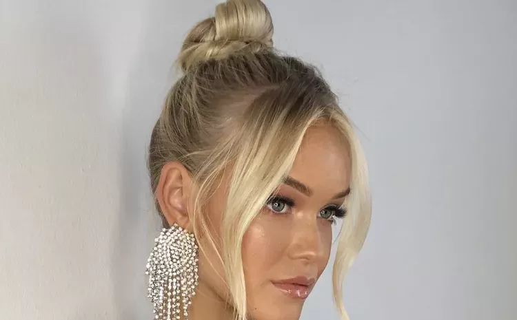 top-knot-with-face-framing-pieces-fcc85e528cf34fb3a3c83119b2fb5e0f
