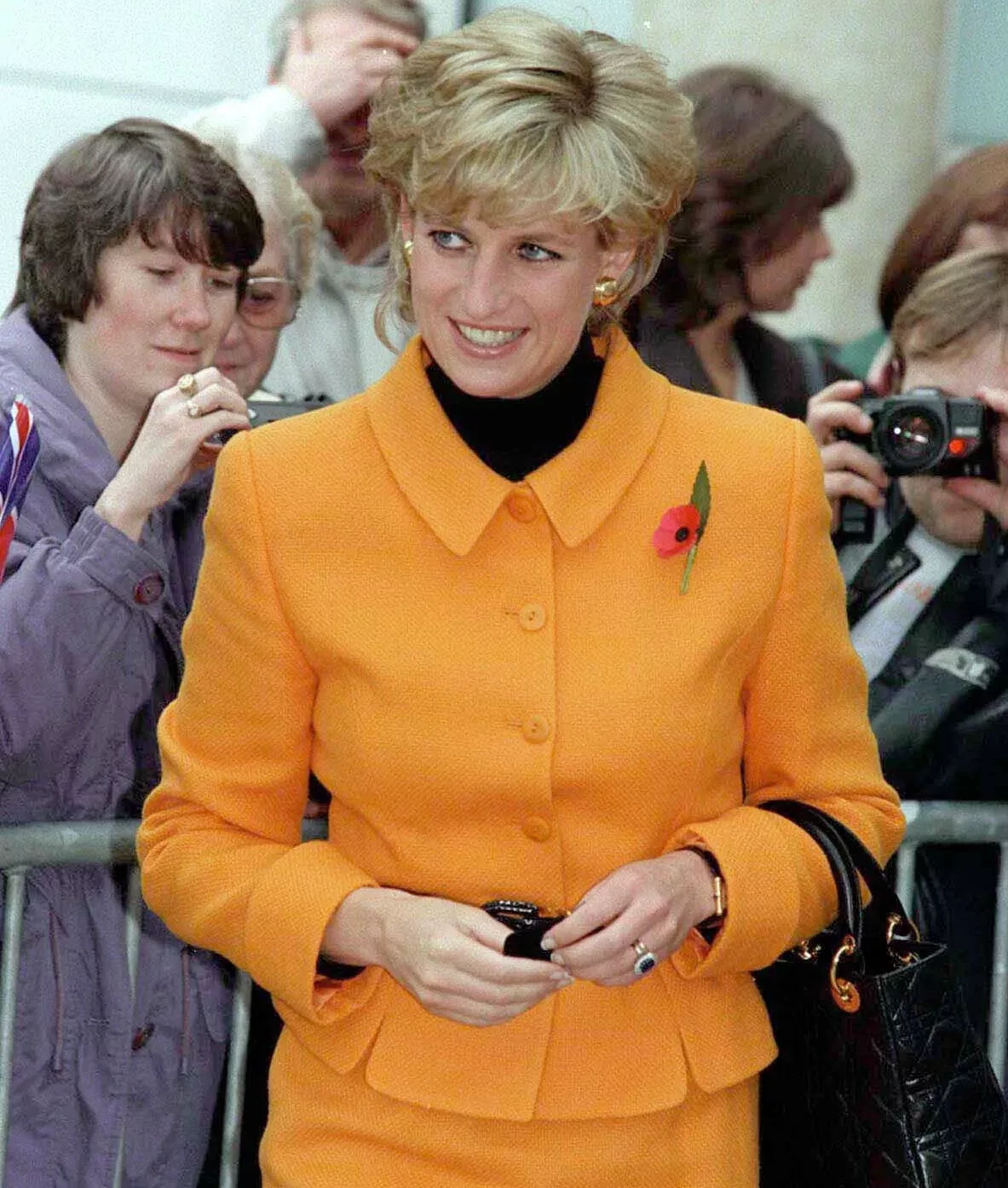 1995-trip-liverpool-diana-wore-orange-versace-skirt-suit