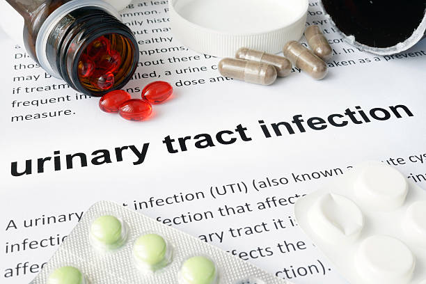paper-with-urinary-tract-infection-and-pills-medical-concept
