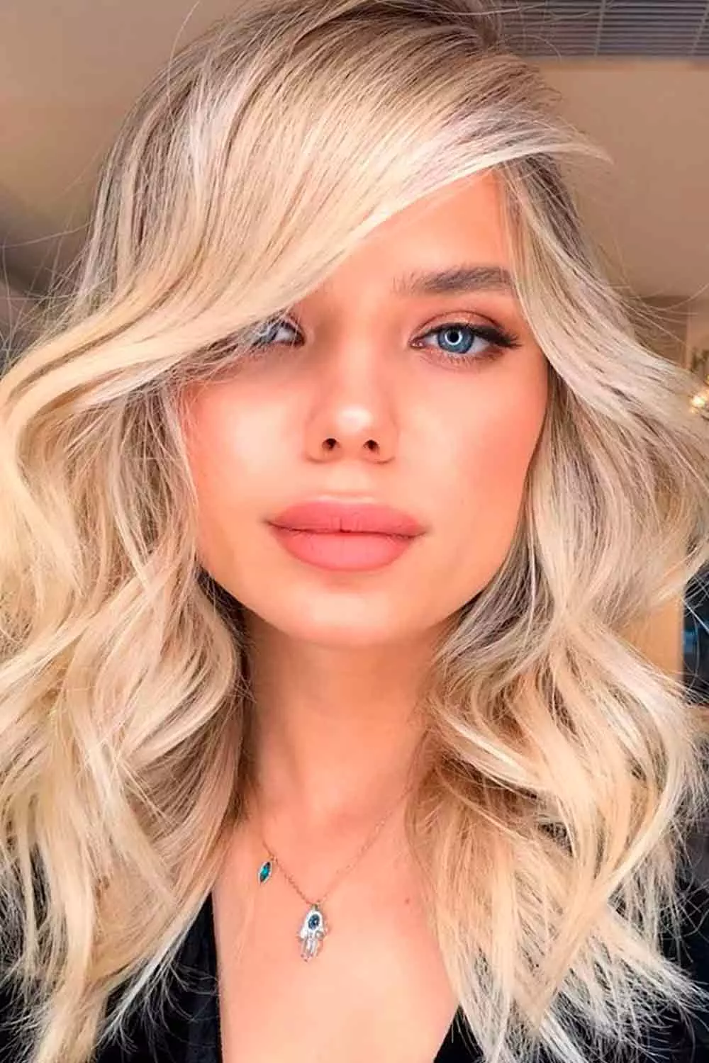 big-forehead-hairstyles-wavy-side-parted33