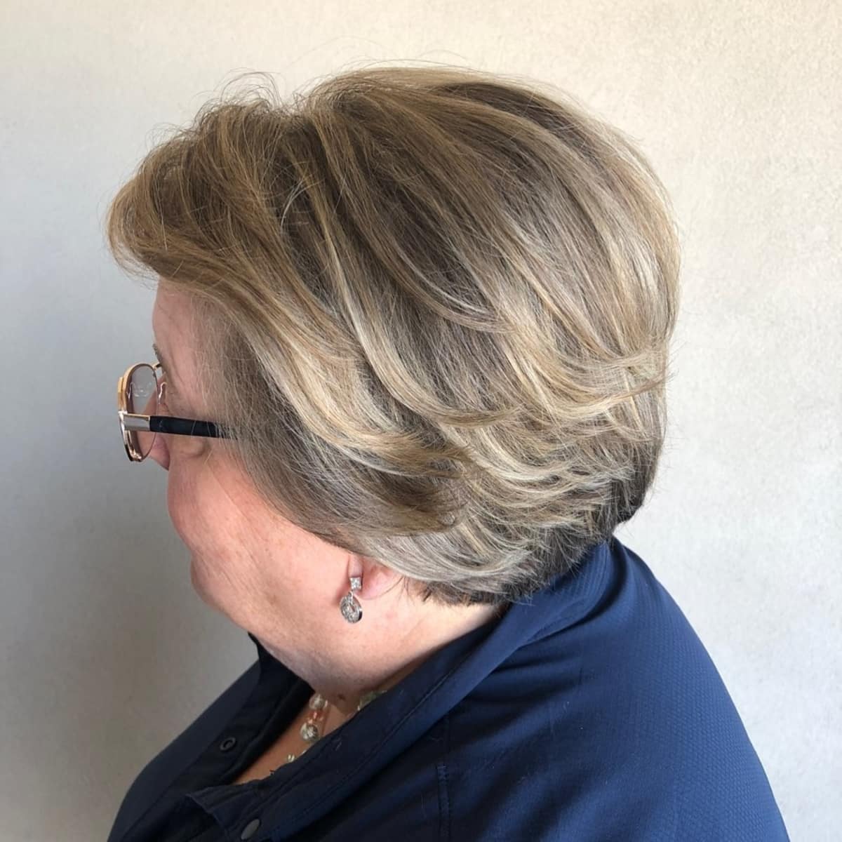 feathered-layers-for-women-in-their-sixties-with-round-face