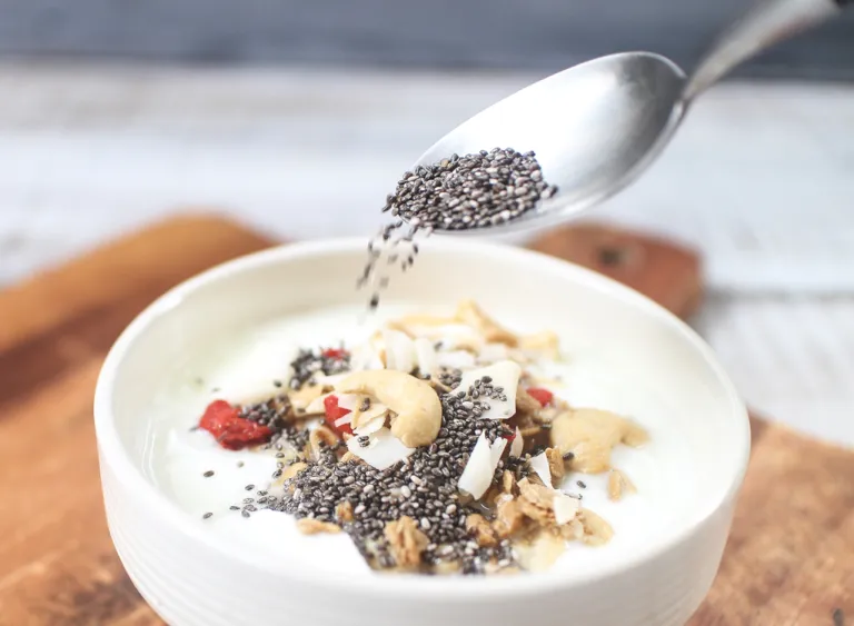 pour-chia-seeds-cashews-yogurt