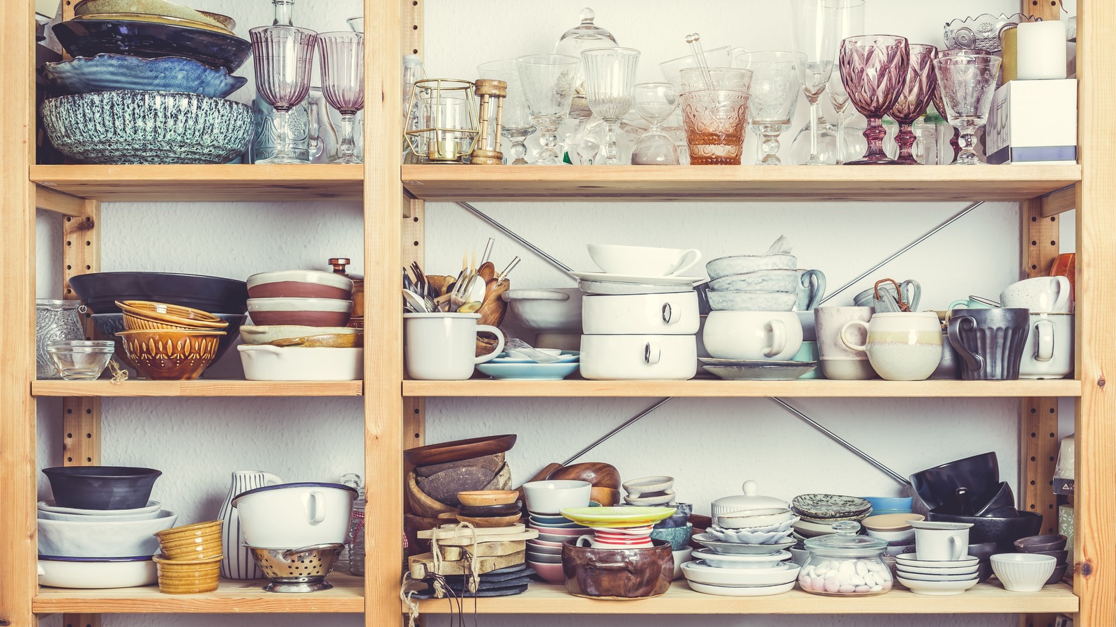 shelveswithkitchenclutterutensilsandkitchenware-conceptoftidying