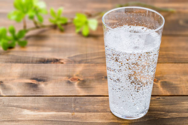 carbonated-water-on-wood-grain-background
