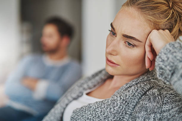 cropped-shot-of-an-unhappy-young-couple-after-a-fight-at-home