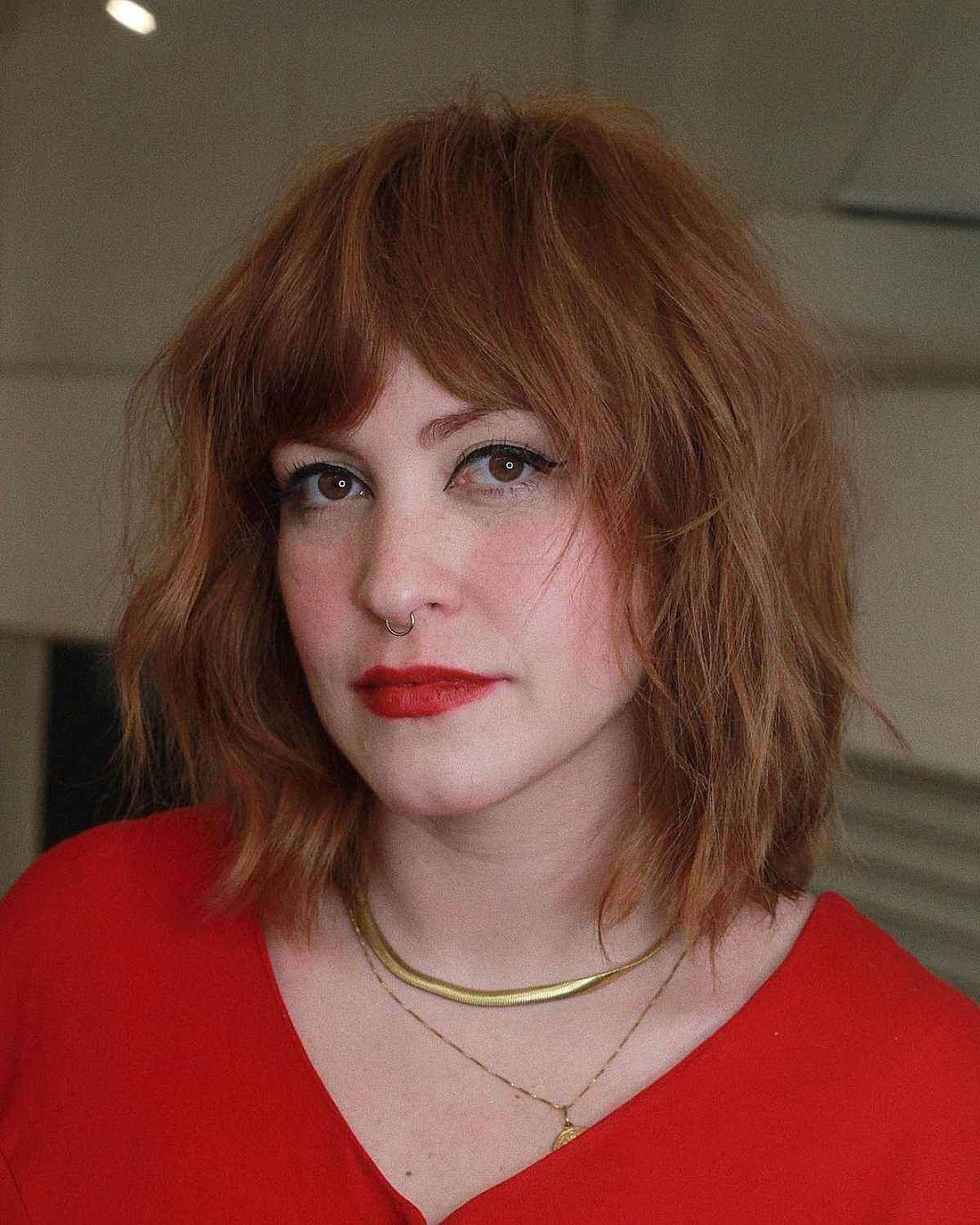 light-brick-red-bob-with-curtain-bangs