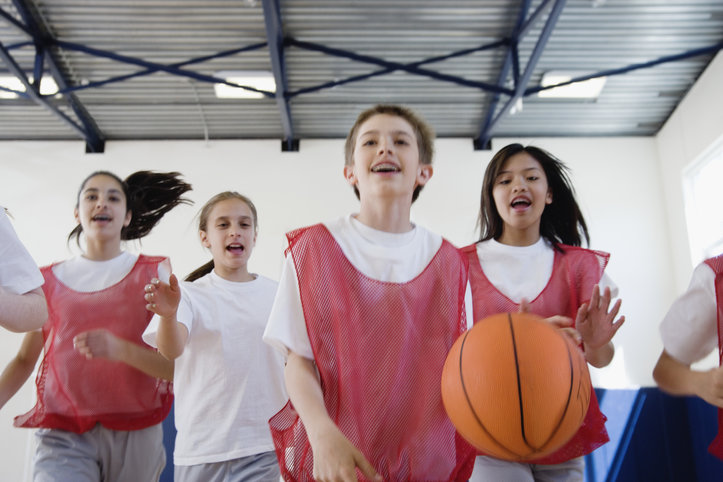 group-of-students-playing-basketball