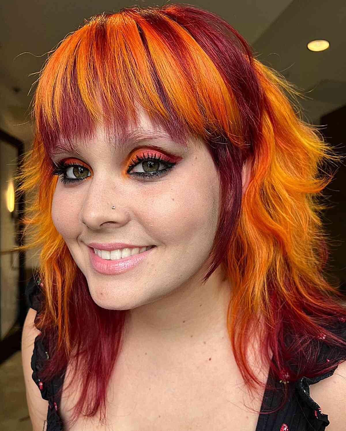 vibrant-red-and-orange-toned-hair