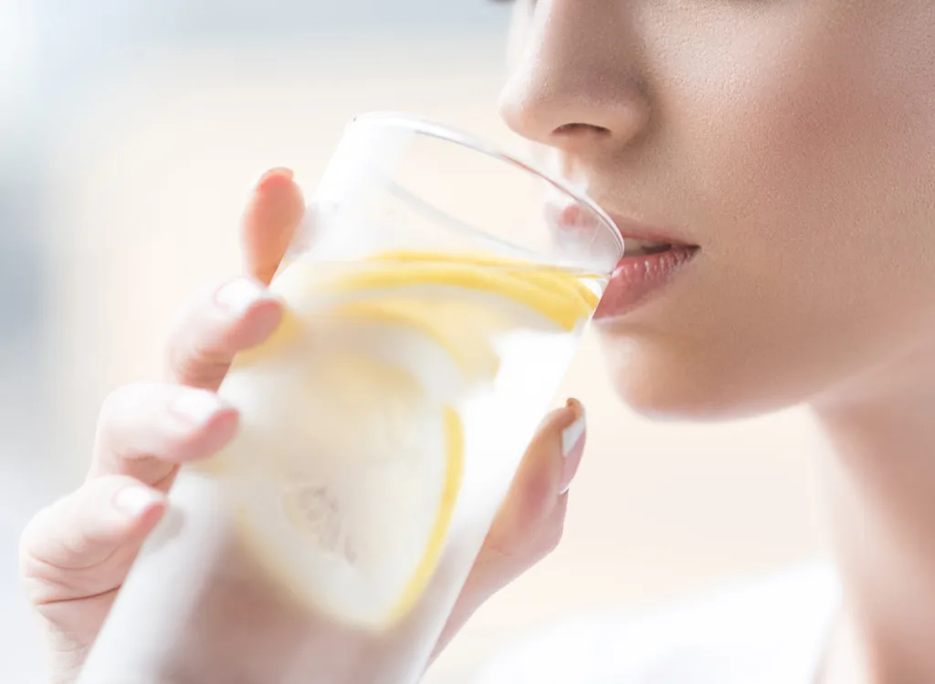woman-drinking-lemon-water