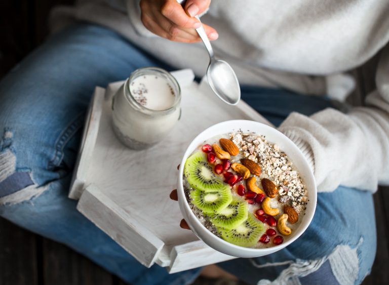 woman-holding-healthy-breakfast-1