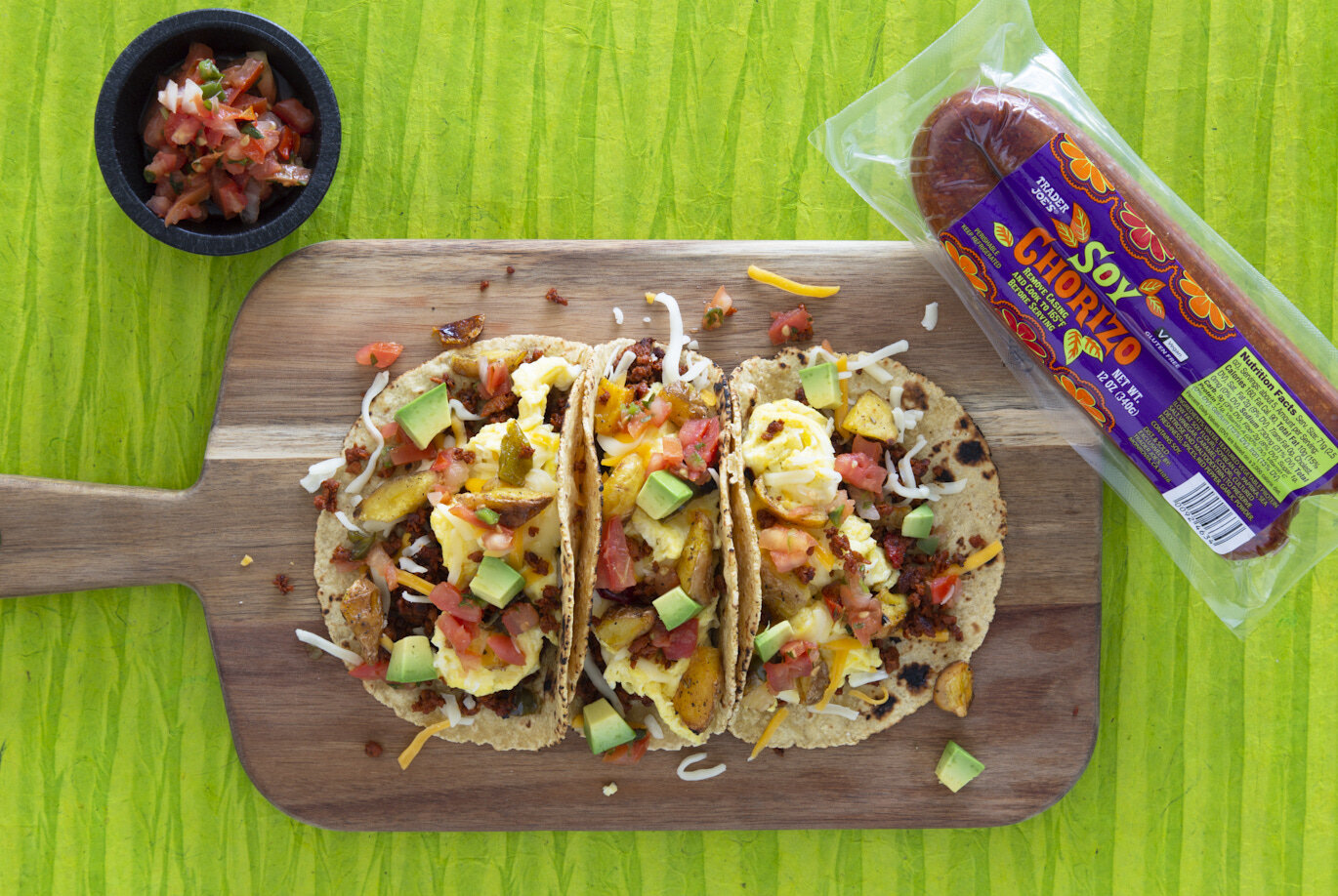 3-breakfast-tacos-recipe-on-a-wood-board-recipe-made-wth-tjs-soy-chorizo