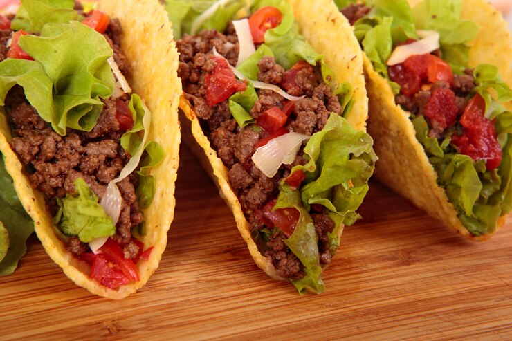 mexican-tacos-wooden-table_1147-558