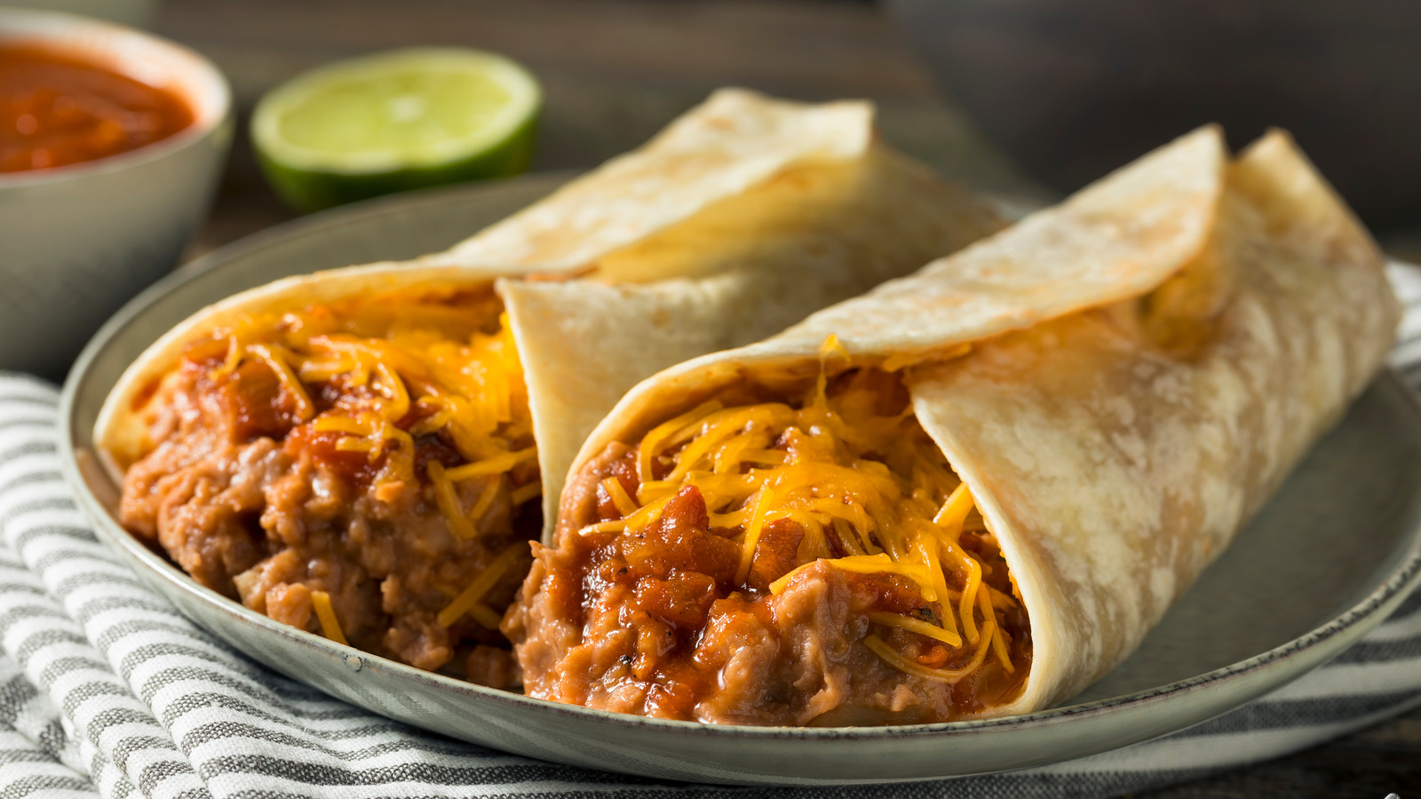 homemadebeanandcheeseburritoinatortilla