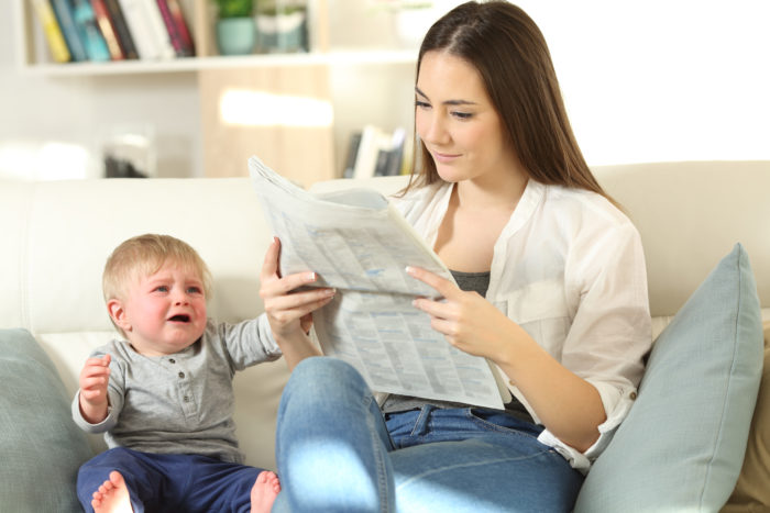 baby-demanding-attention-and-mother-ignoring-him