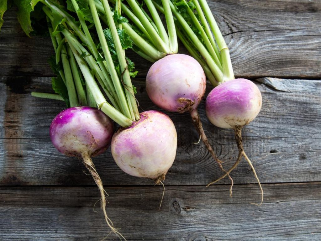 a-bunch-of-turnips-on-a-table