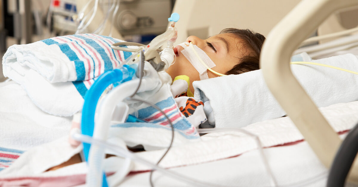 hispanic-boy-in-intensive-care-unit-bed