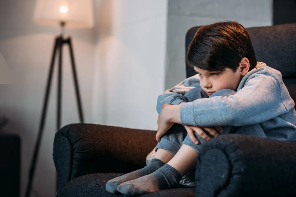 neglect-lonely-boy-sits-on-couch-1024x683-jpeg