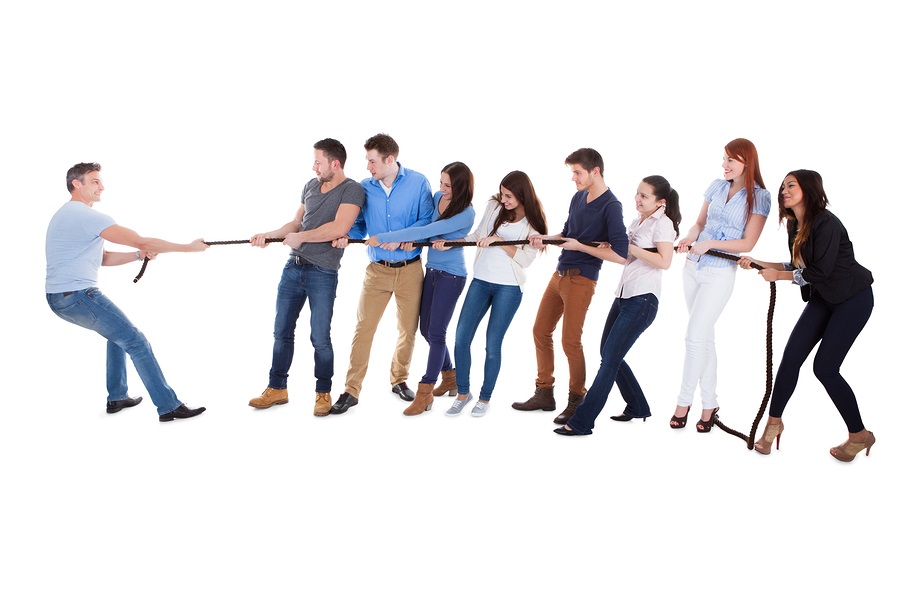 group-of-people-having-a-tug-of-war